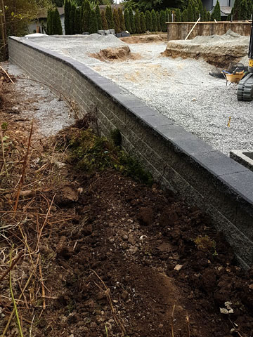 Stone, Timber and Brick Retaining Walls